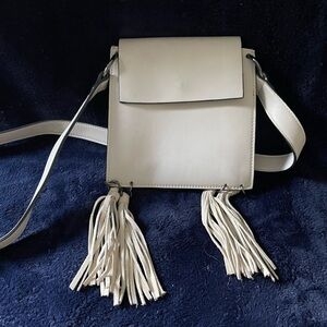 Elegant Cream Crossbody Bag with Tassels